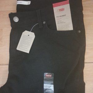 Levis 711 skinny black ripped jeans